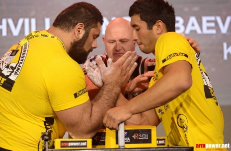 The pursuit for the mass: Saginashvili - Ongarbaev